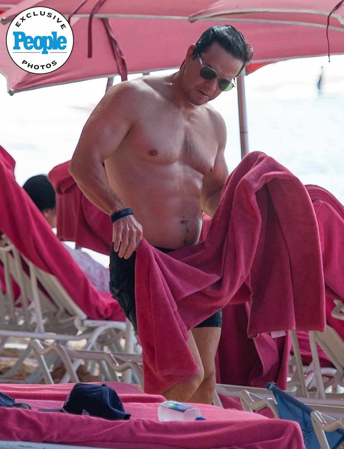 A Shirtless and RIPPED Mark Wahlberg is spotted wearing on-trend short shorts at Sandy Lane Hotel during Barbados getaway 