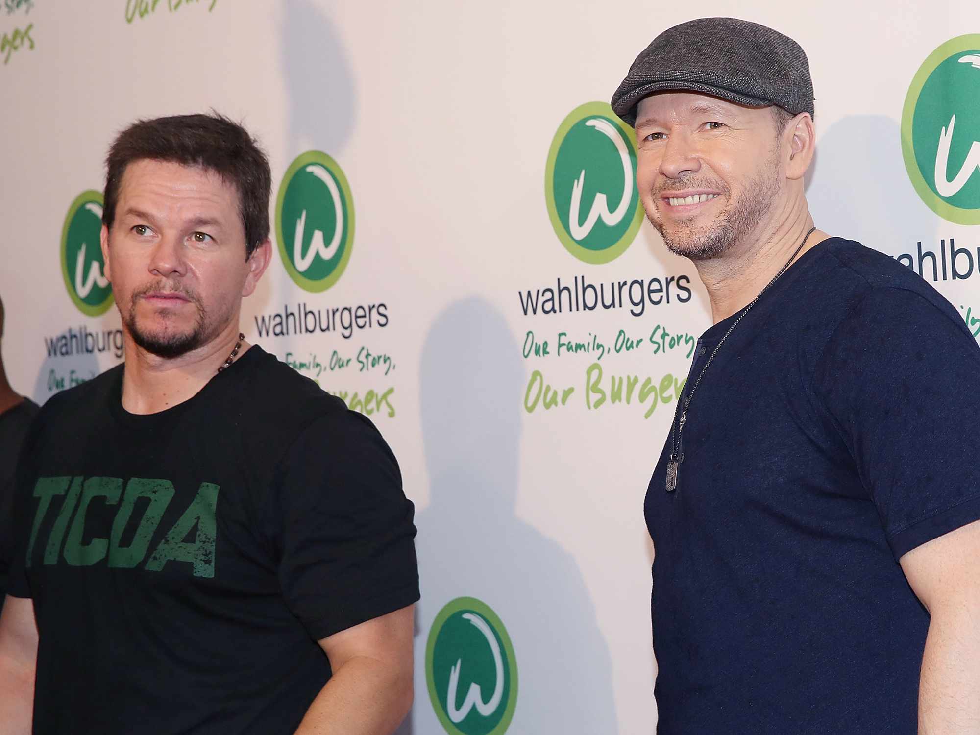 Mark Wahlberg and Donnie Wahlberg attend the Wahlburgers Coney Island VIP Preview Party at Wahlburgers Coney Island on June 23, 2015 in New York City.