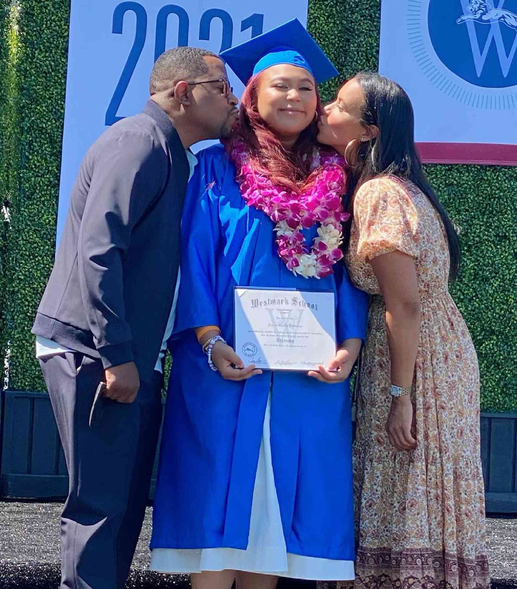 Amara Lawrence and her parents