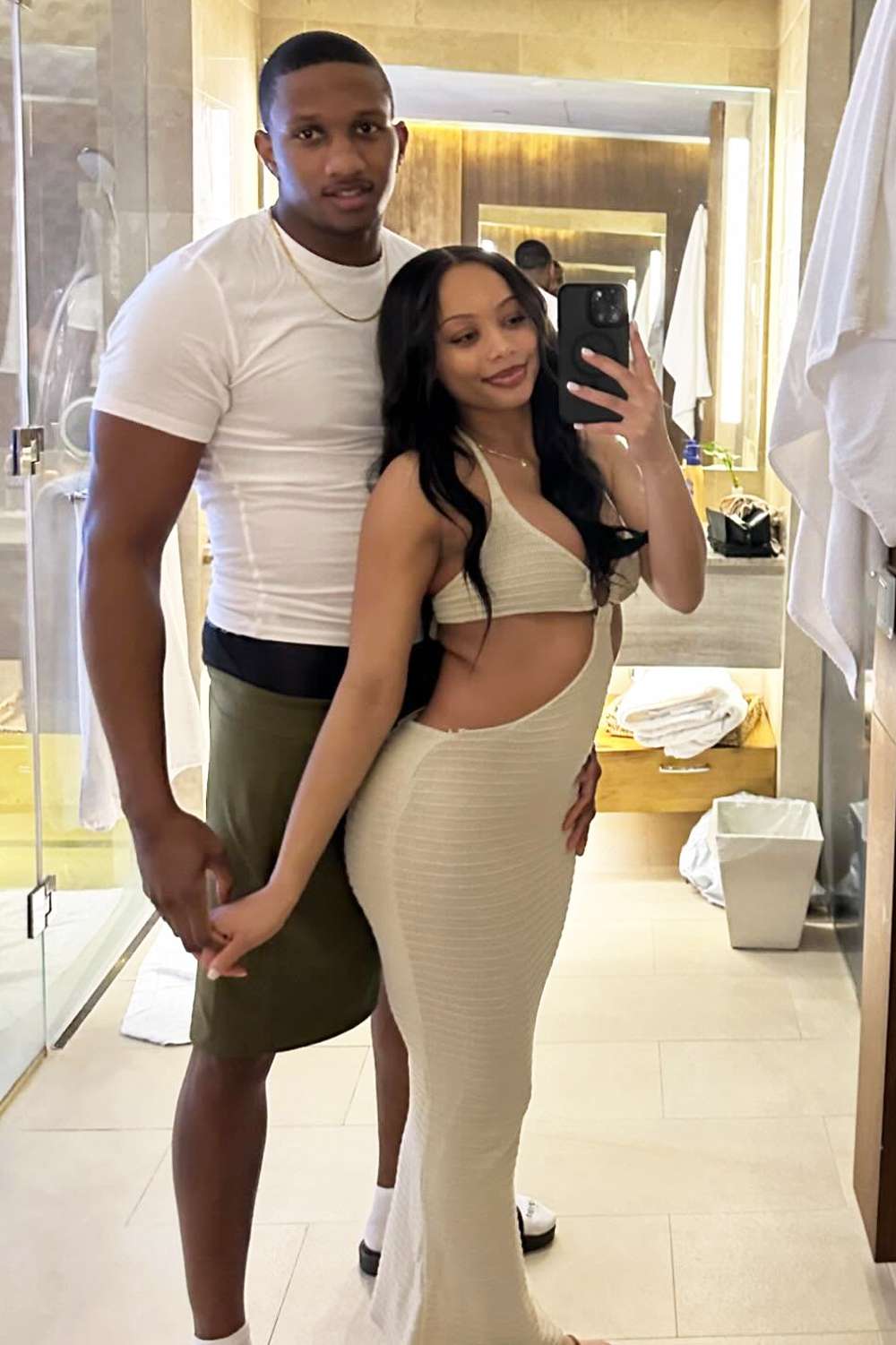 Michael Penix Jr and his girlfriend Olivia Carter together in May 2024 in Montego Bay, Jamaica.