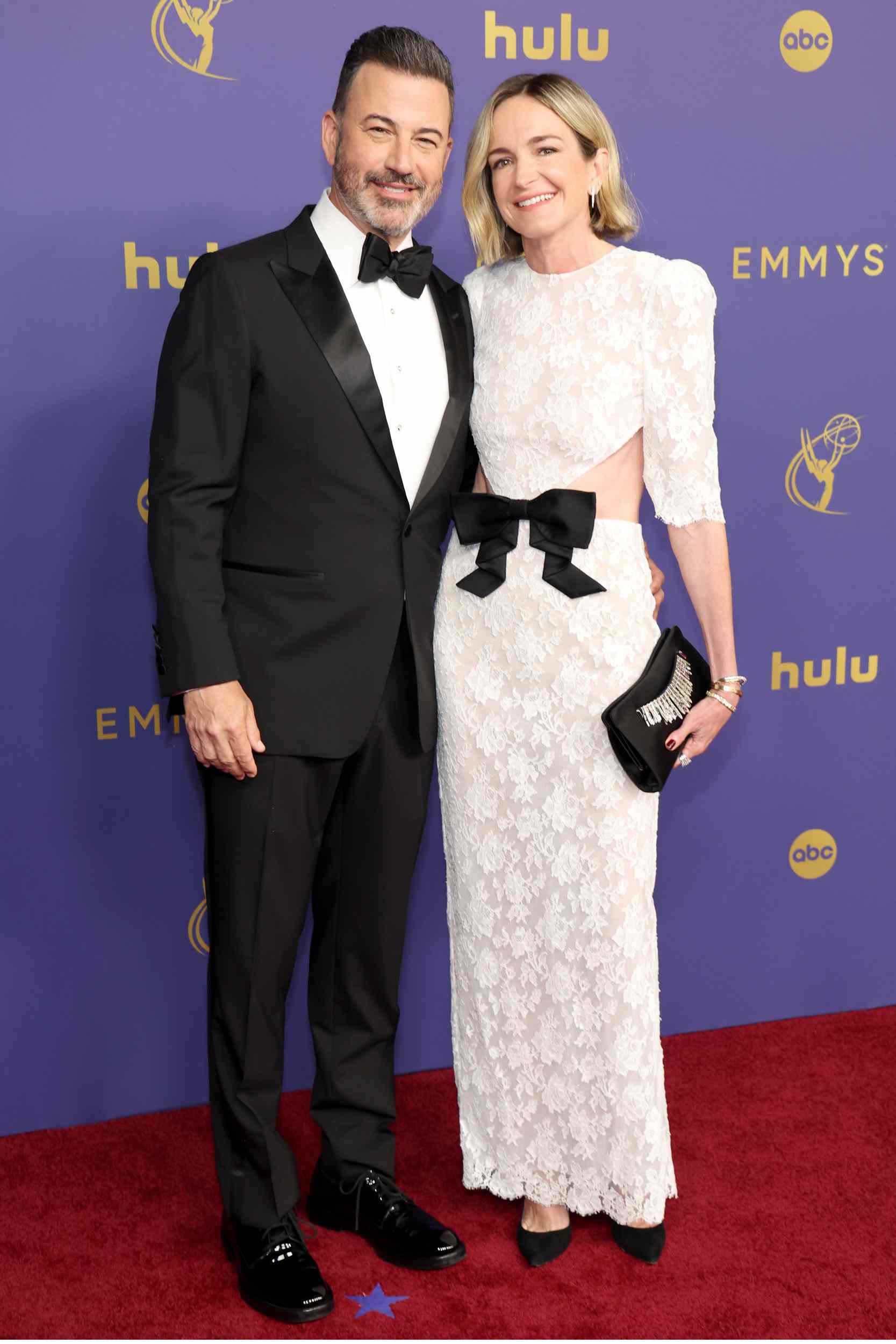 Jimmy Kimmel and Molly McNearney attend the 76th Primetime Emmy Awards at Peacock Theater.