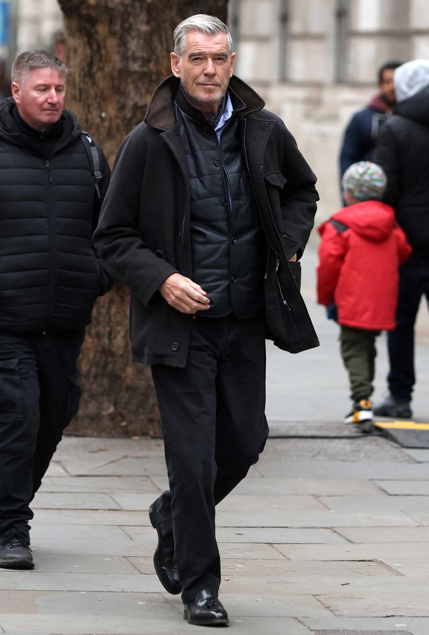 EXCLUSIVE: Pierce Brosnan spotted filming Guy Richie?s The Fixer/The Associate in London