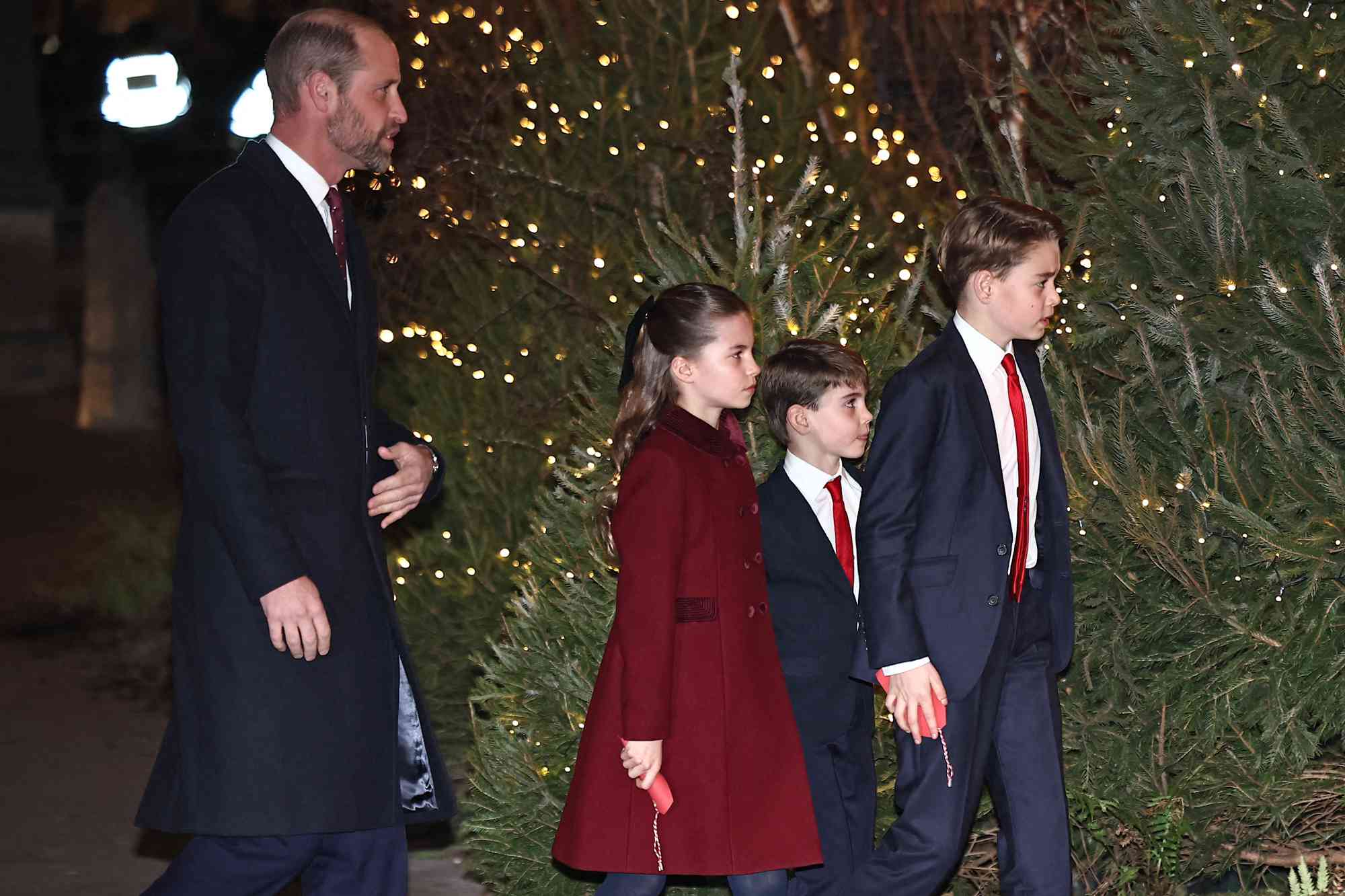 Britain's Prince William, Prince of Wales (L) Britain's Princess Charlotte (2L) of Wales, Britain's Prince Louis of Wales(C) and Britain's Prince George of Wales arrive to attend the "Together At Christmas" Carol Service" at Westminster Abbey in London on December 6, 2024.