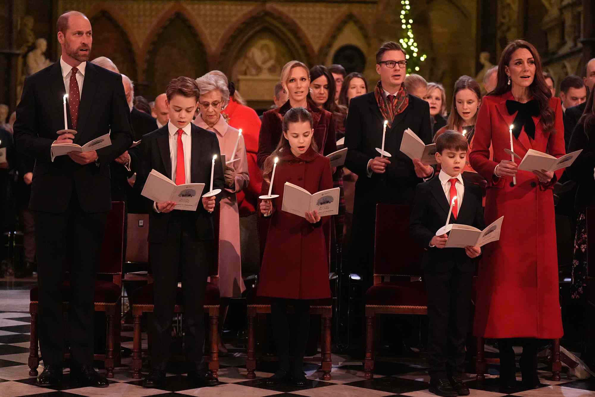 Prince William, Prince of Wales, Prince George, Princess Charlotte, Prince Louis and Catherine, Princess of Wales during the 'Together At Christmas' Carol Service at Westminster Abbey on December 6, 2024 in London, England.