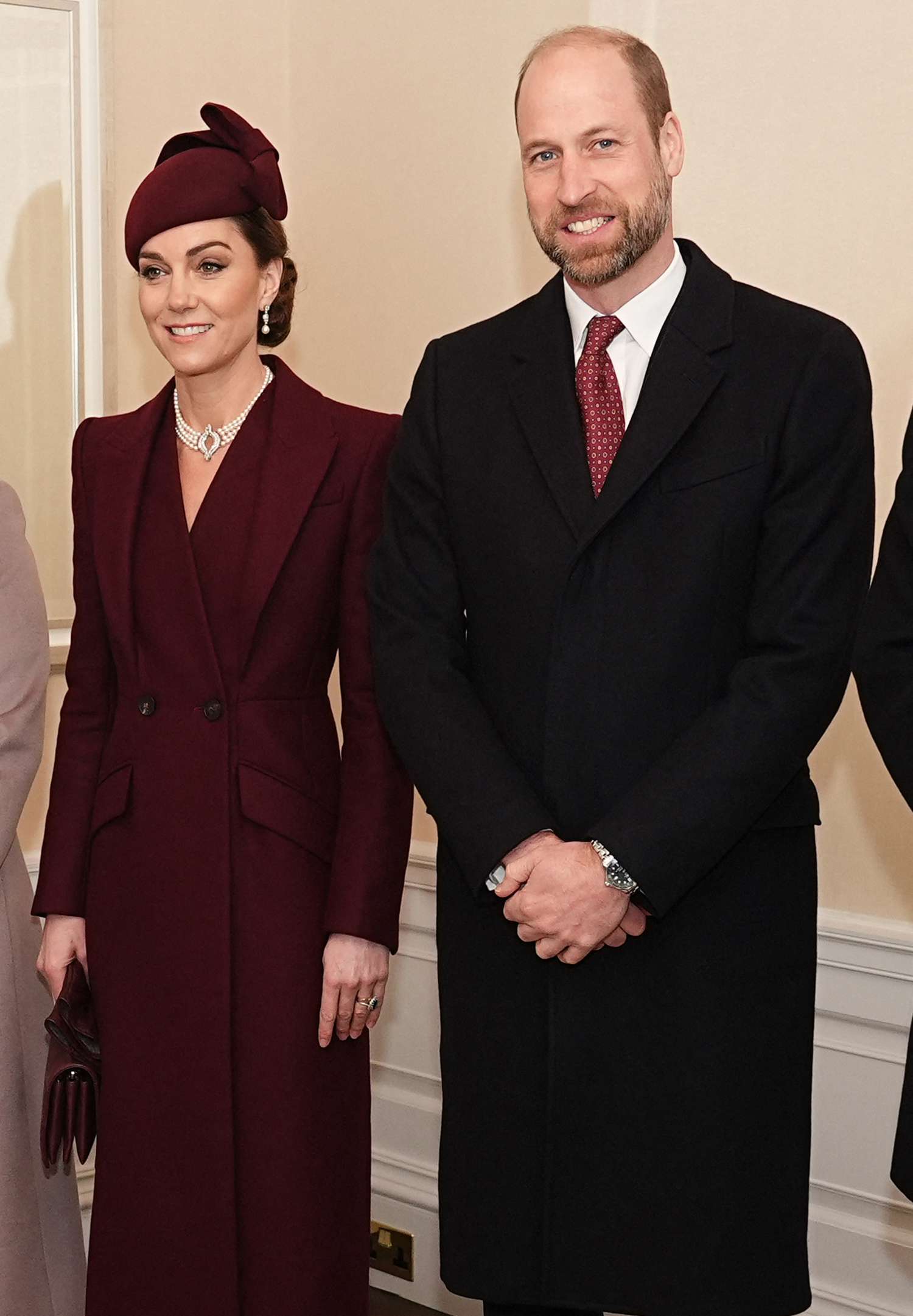 Prince William, Prince of Wales, and his wife Britain's Catherine, Princess of Wales, greet Qatar's Emir and his wife (not seen) at their residence in London on December 3, 2024