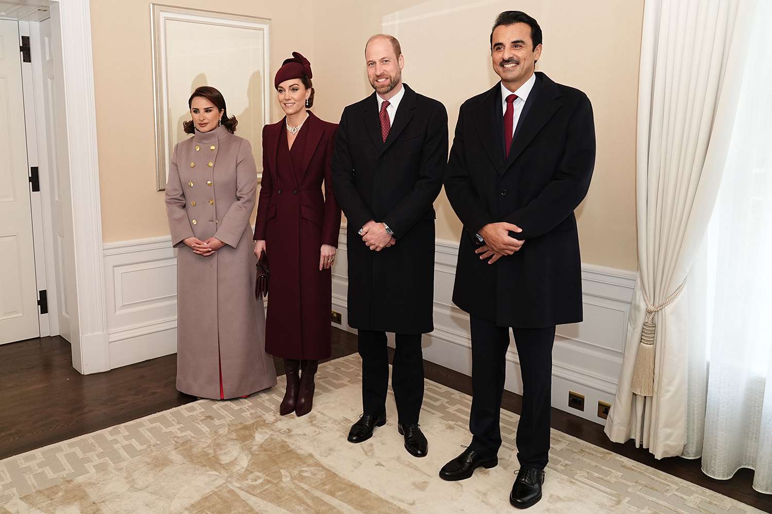 Catherine, Princess of Wales (C-L) and Prince William, Prince of Wales (C-R), greet the Emir of Qatar Sheikh Tamim bin Hamad Al Thani and his wife Sheikha Jawaher on behalf of King Charles III, before the ceremonial welcome at Horse Guards Parade during day one of The Amir of the State of Qatar's visit