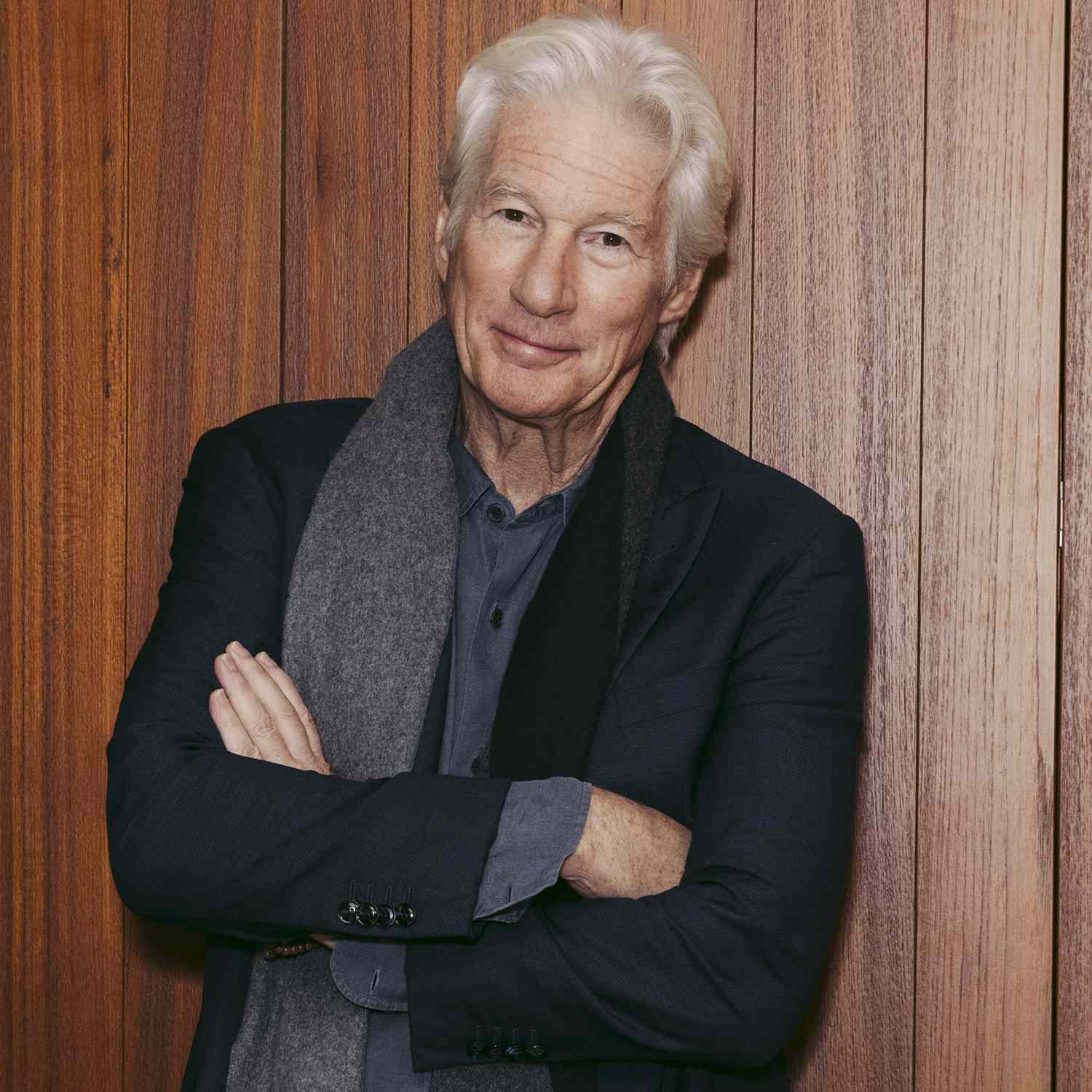 In this image released on December 23, Richard Gere poses for photographer at Bulgari Hotel 