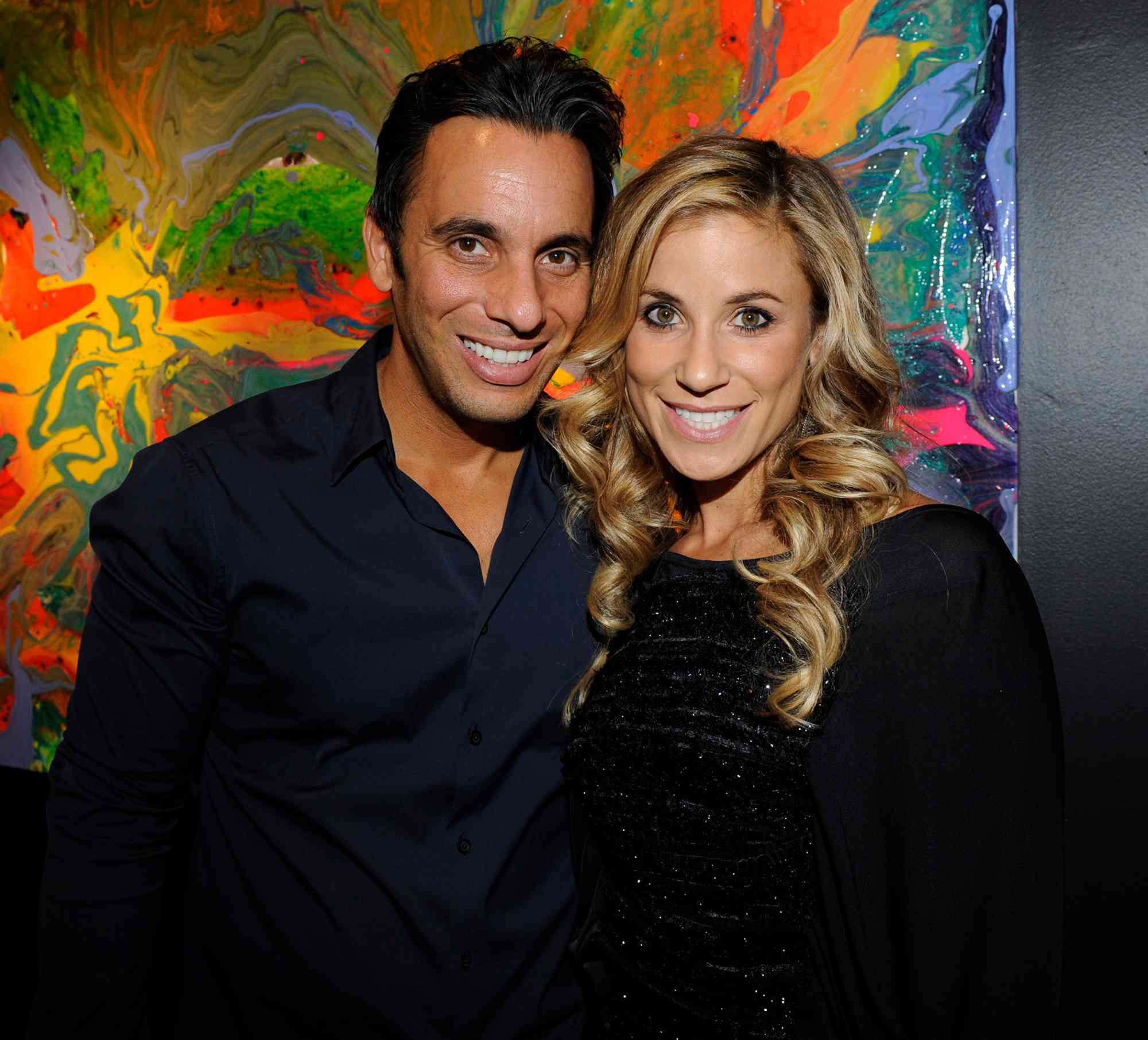 Sebastian Maniscalco and artist Lana Gomez attend the Lana Gomez Art Show at Roseark on November 11, 2011 in Los Angeles, California