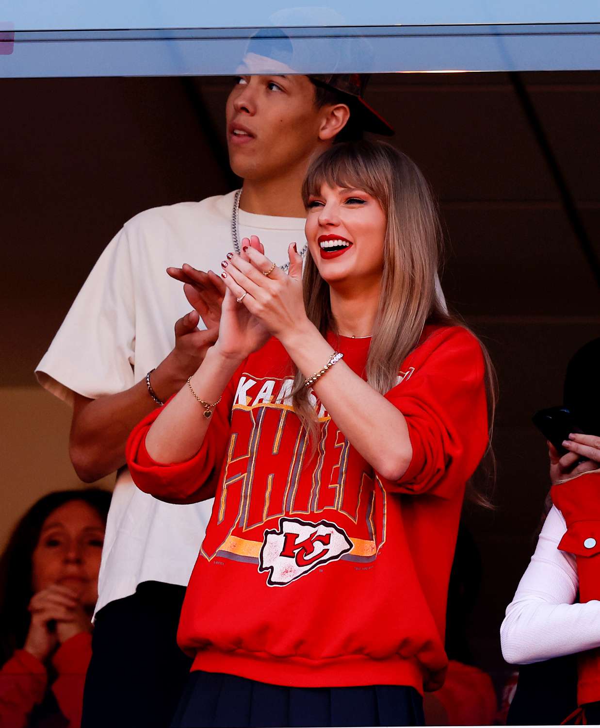 Taylor Swift and Brittany Mahomes react during a game between the Los Angeles Chargers and Kansas City Chiefs at GEHA Field at Arrowhead Stadium on October 22, 2023 in Kansas City, Missouri