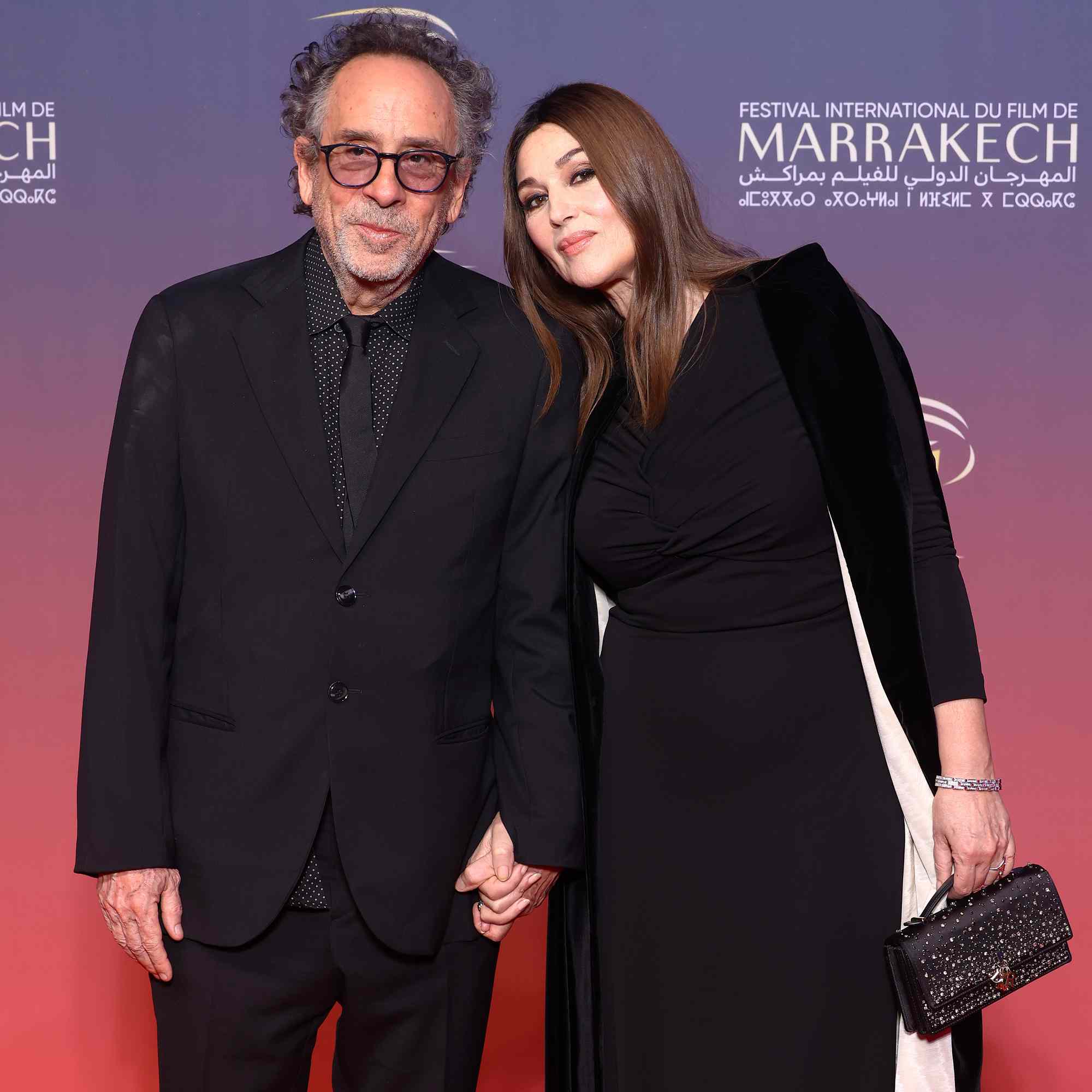 Tim Burton and Monica Bellucci attend the Opening Ceremony and screening of The Order during the 21st Marrakech International Film Festival on November 29, 2024 in Marrakech, Morocco. 