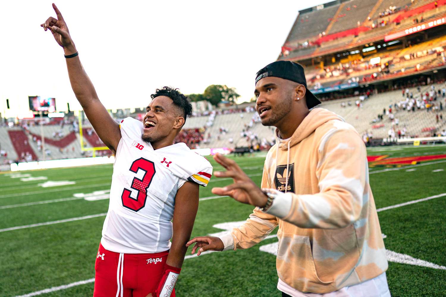 Maryland Terrapins quarterback Taulia Tagovailoa and brother Tua Tagovailoa after the game between West Virginia and Maryland on September 4, 2021 at Maryland Stadium in College Park, MD.