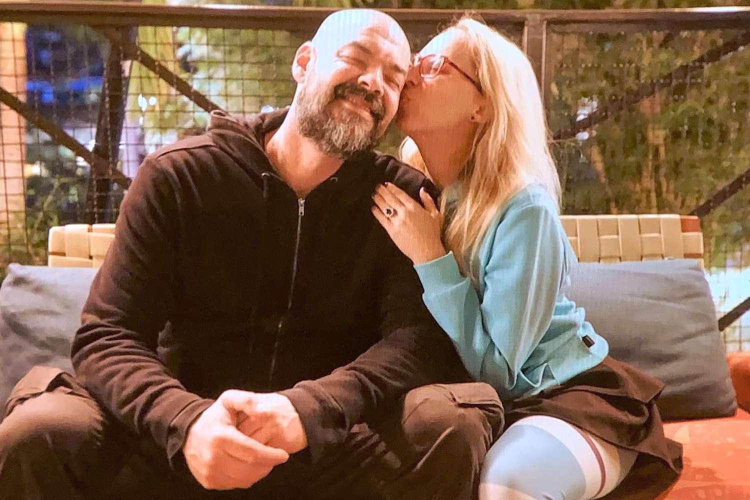 Aaron Goodwin smiles with wife Victoria Goodwin.