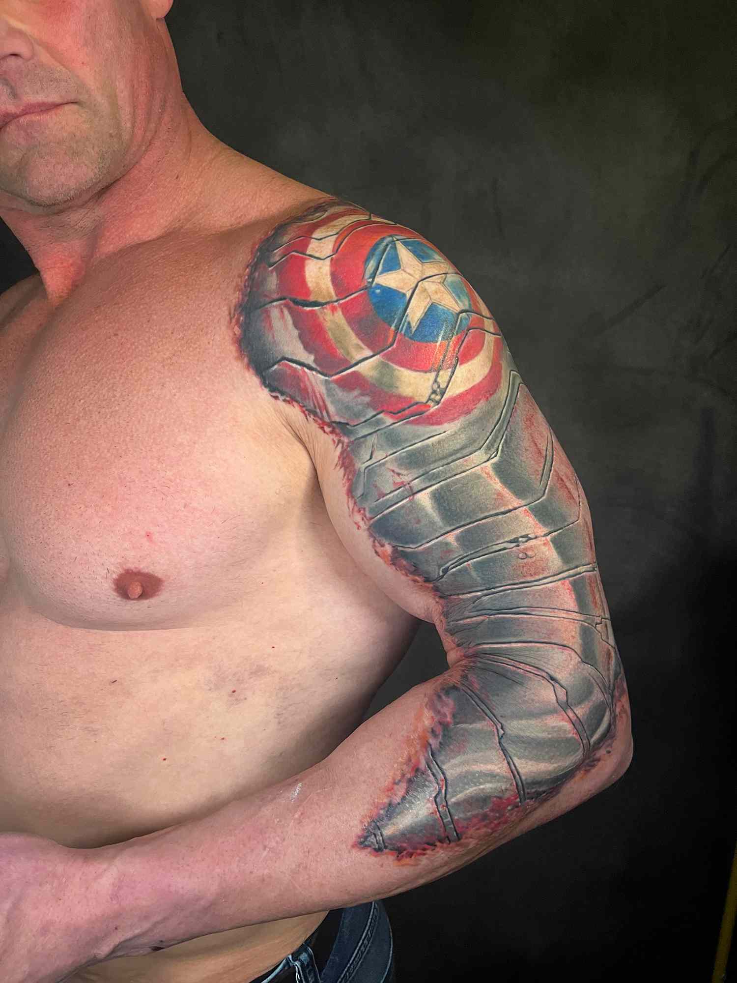 Chris Evans Surprised a Captain America Superfan When He Completed His Tattoo Tribute: 'He Was Shocked' 