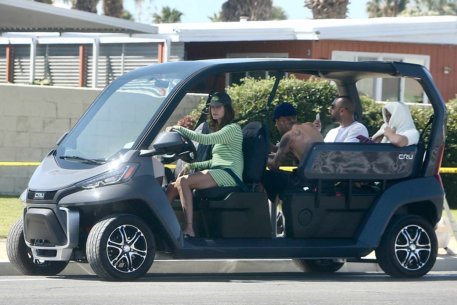 Hailey and Justin Bieber were spotted en route to Coachella with their crew, picking up festival credentials