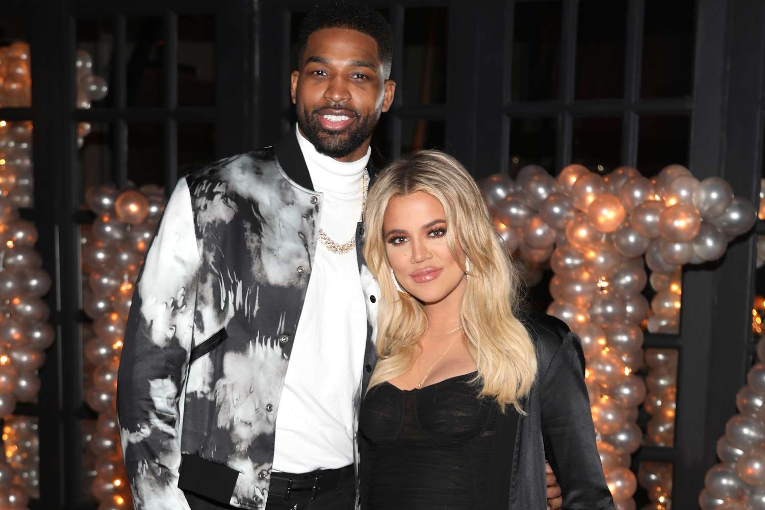 Tristan Thompson and Khloé Kardashian pose for a photo as Remy Martin celebrates Tristan Thompson's Birthday at Beauty & Essex on March 10, 2018 in Los Angeles, California