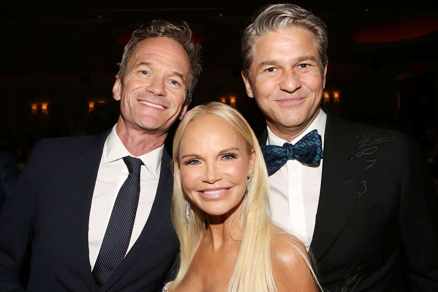 Neil Patrick Harris, Kristin Chenoweth and David Burtka pose at the opening night of The Manhattan Theatre Club's production of "Stephen Sondheim's Old Friends"