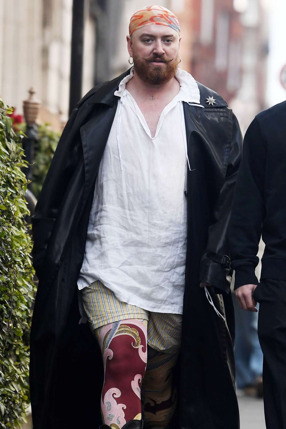 Sam Smith out and about in Mayfair London after having a heated discussion with a male friend