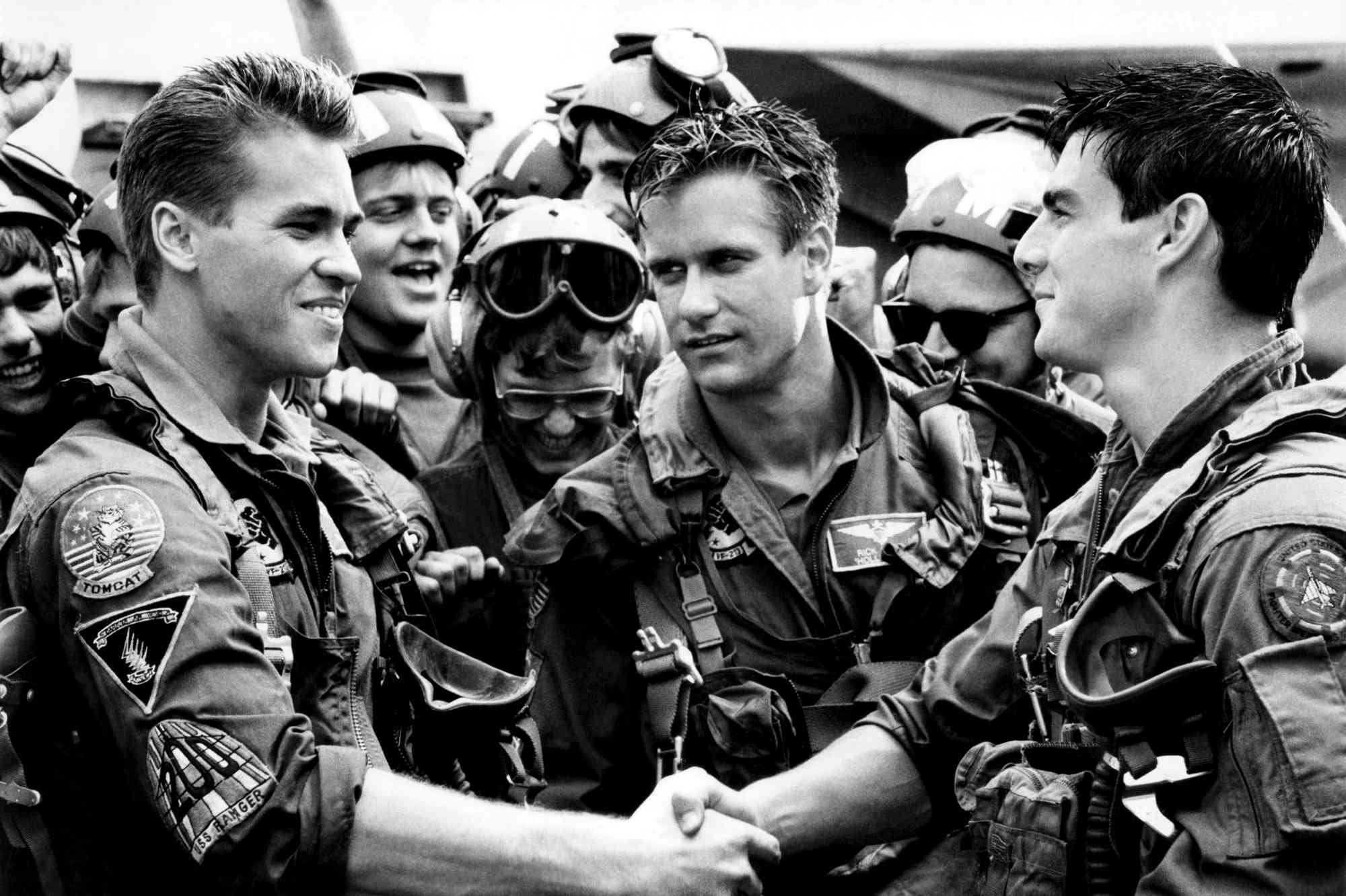 TOP GUN, from left, Val Kilmer, Barry Tubb, Tom Cruise, 1986, &copy;Paramount/courtesy Everett Collection