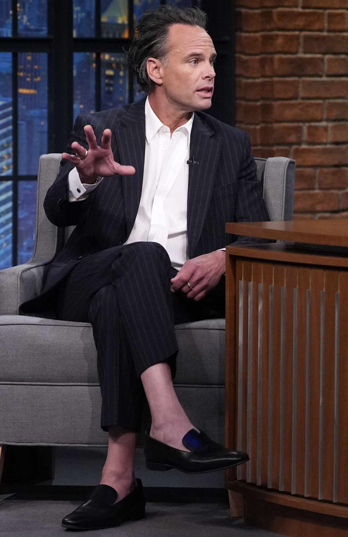 Walton Goggins during an interview with host Seth Meyers
